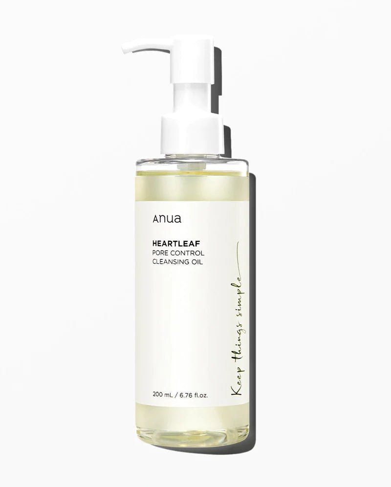 Clear bottle of Heartleaf Pore Control Cleansing Oil with pump dispenser on white background